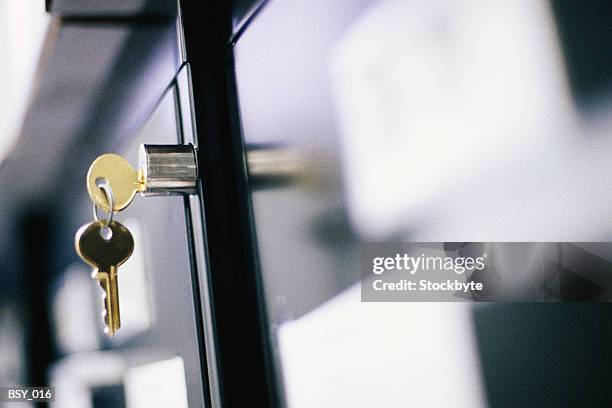 keys hanging in file cabinet lock - hanging file stock pictures, royalty-free photos & images