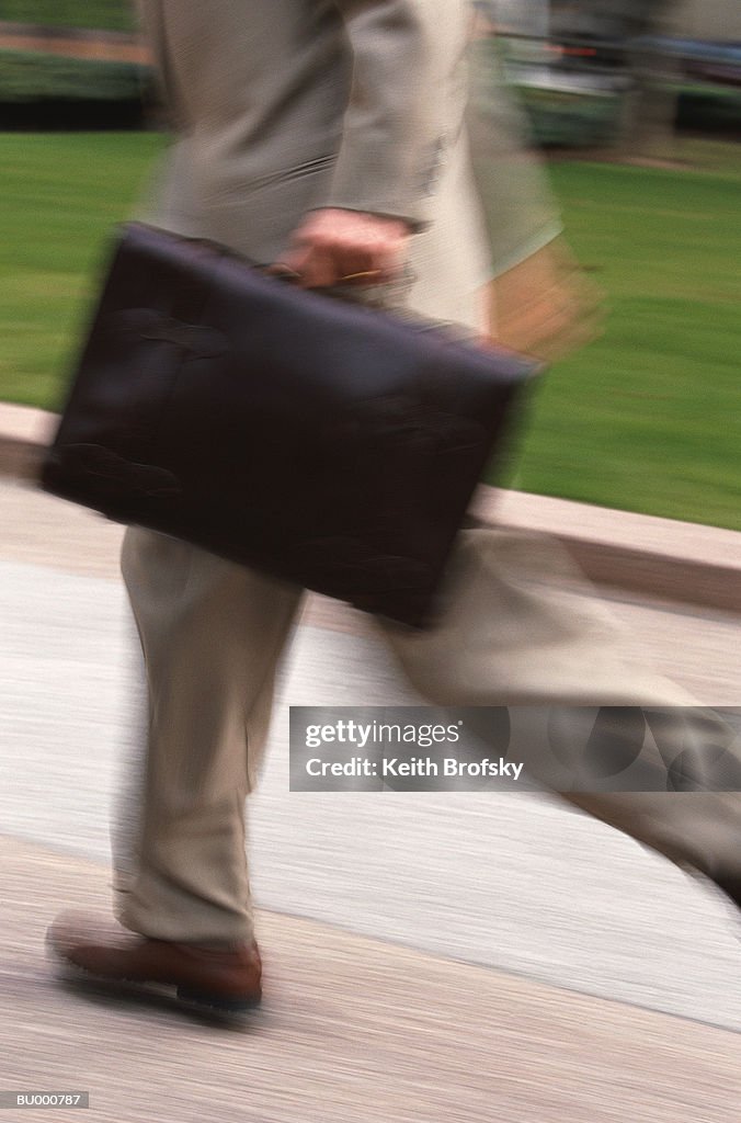 Businessman Running With a Briefcase