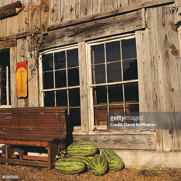 old general store selling watermelon - general images of commuters as australia employment figures are released stockfoto's en -beelden