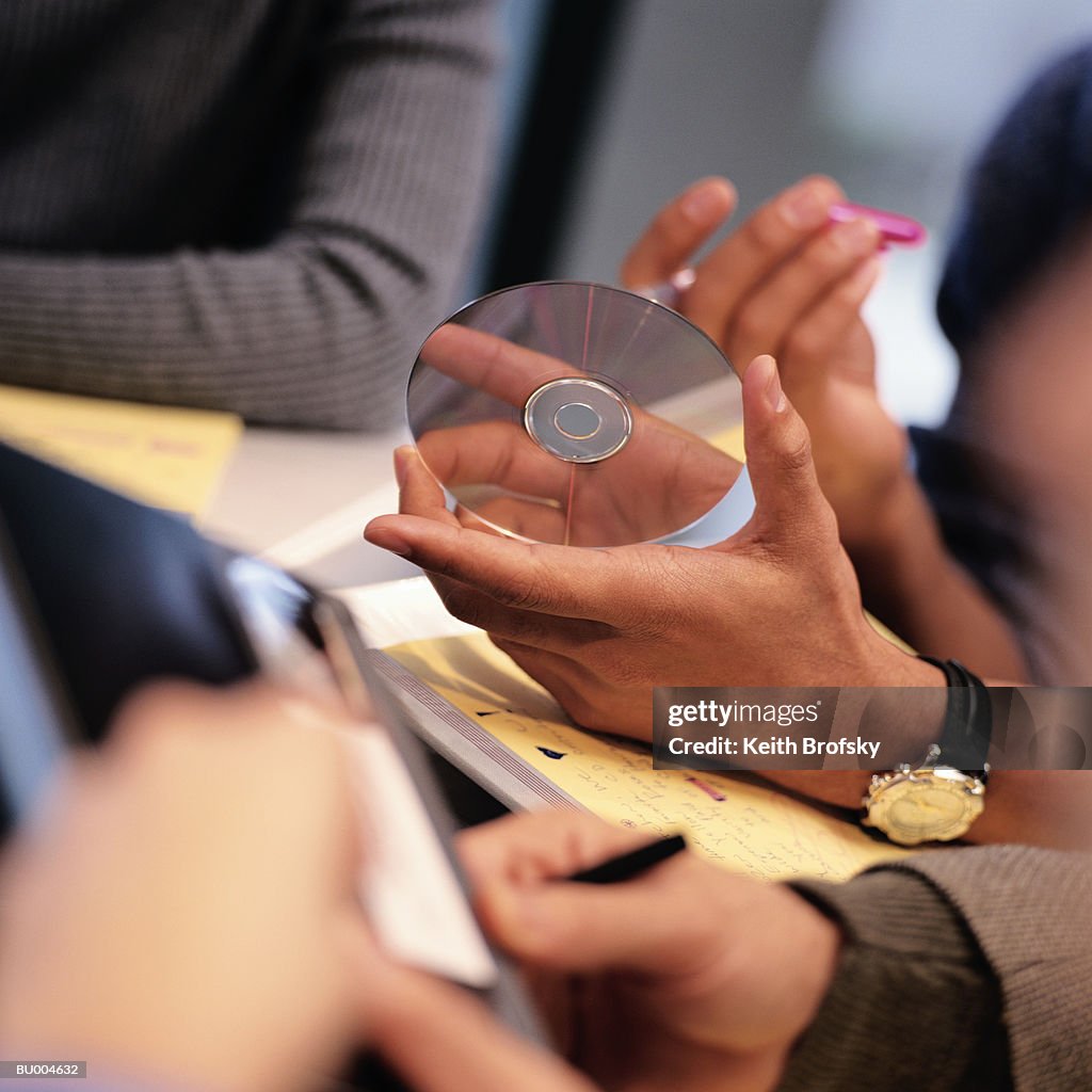 Holding a CD