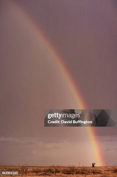 rainbow and oil pump - david wish stock pictures, royalty-free photos & images