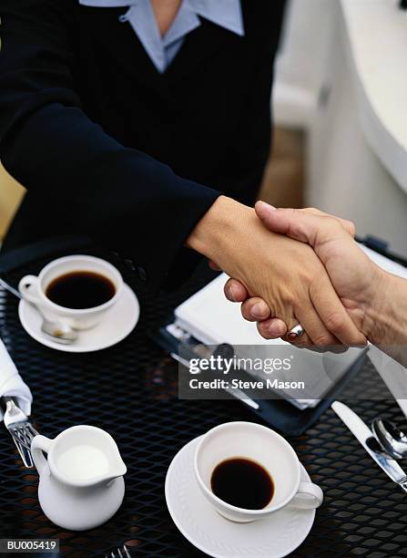 Handshake Over Tea 88 Handshake Over Food Stock Photos, High-Res Pictures, and Images ...