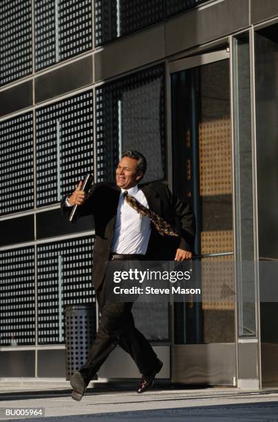Man Rushing Out A Door Man Running Out Door Photos and Premium High Res Pictures - Getty Images