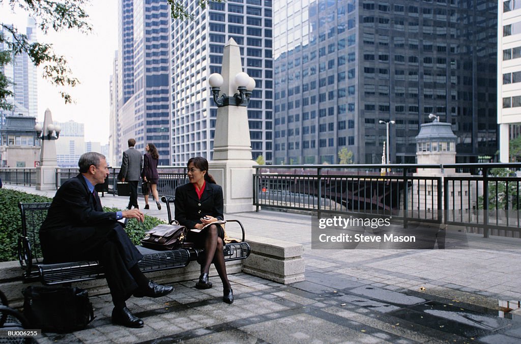 Businesspeople on Park Bench Downtown