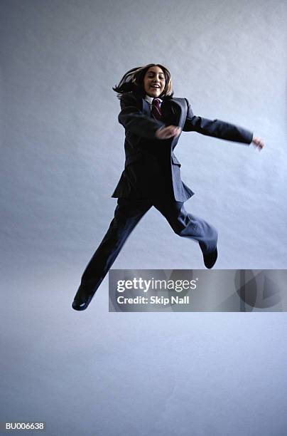 businessgirl jumping for joy - adult imitation stock pictures, royalty-free photos & images