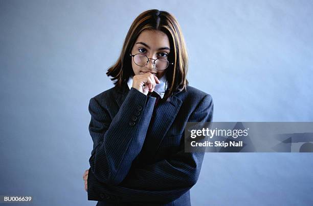 businessgirl thinking - adult imitation stock pictures, royalty-free photos & images