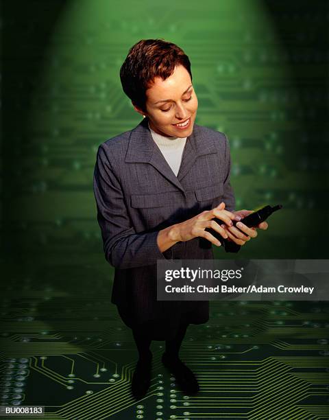 businesswoman against circuit board - wap foto e immagini stock