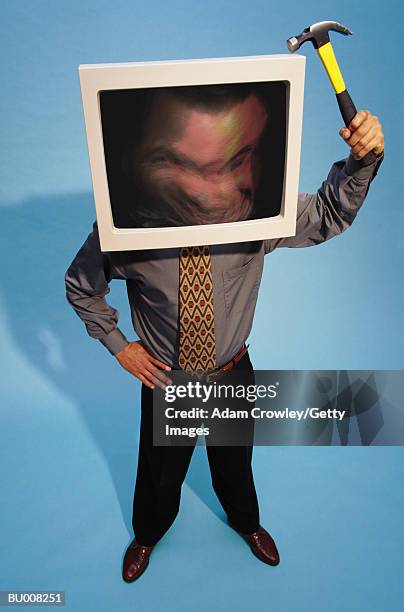 businessman with his head in computer monitor - computer rage stock pictures, royalty-free photos & images