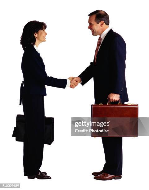 businesspeople shaking hands - buisnessman studio clipping path stock-fotos und bilder