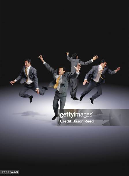 businessmen jumping in all directions - all stock pictures, royalty-free photos & images