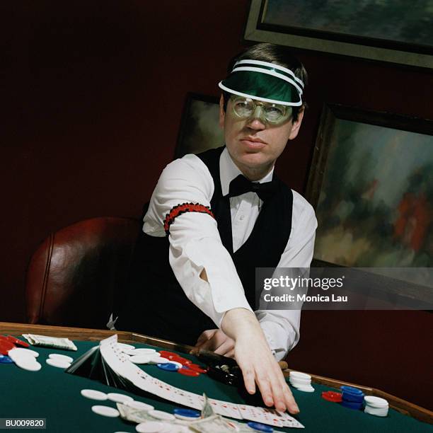 dealer at card table - card table stock pictures, royalty-free photos & images