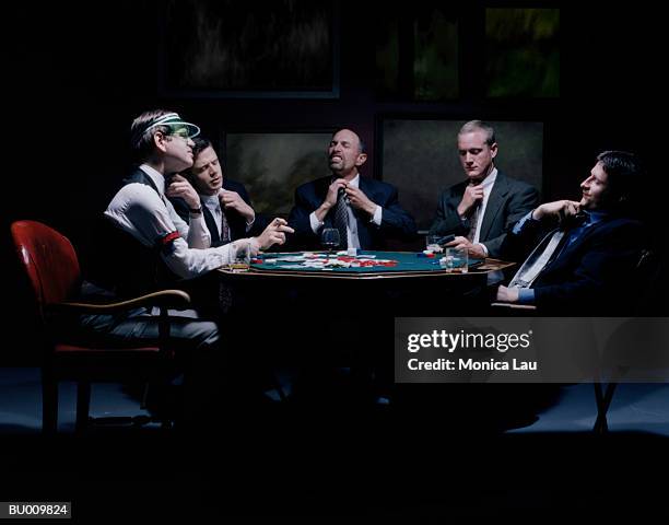 businessmen at card table - card table stock pictures, royalty-free photos & images