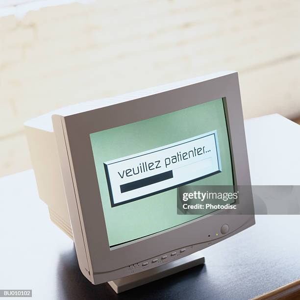 please wait message on a computer monitor - please wait stock pictures, royalty-free photos & images
