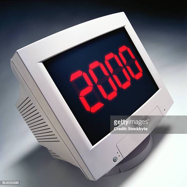 millennium computer monitor - el milenio fotografías e imágenes de stock