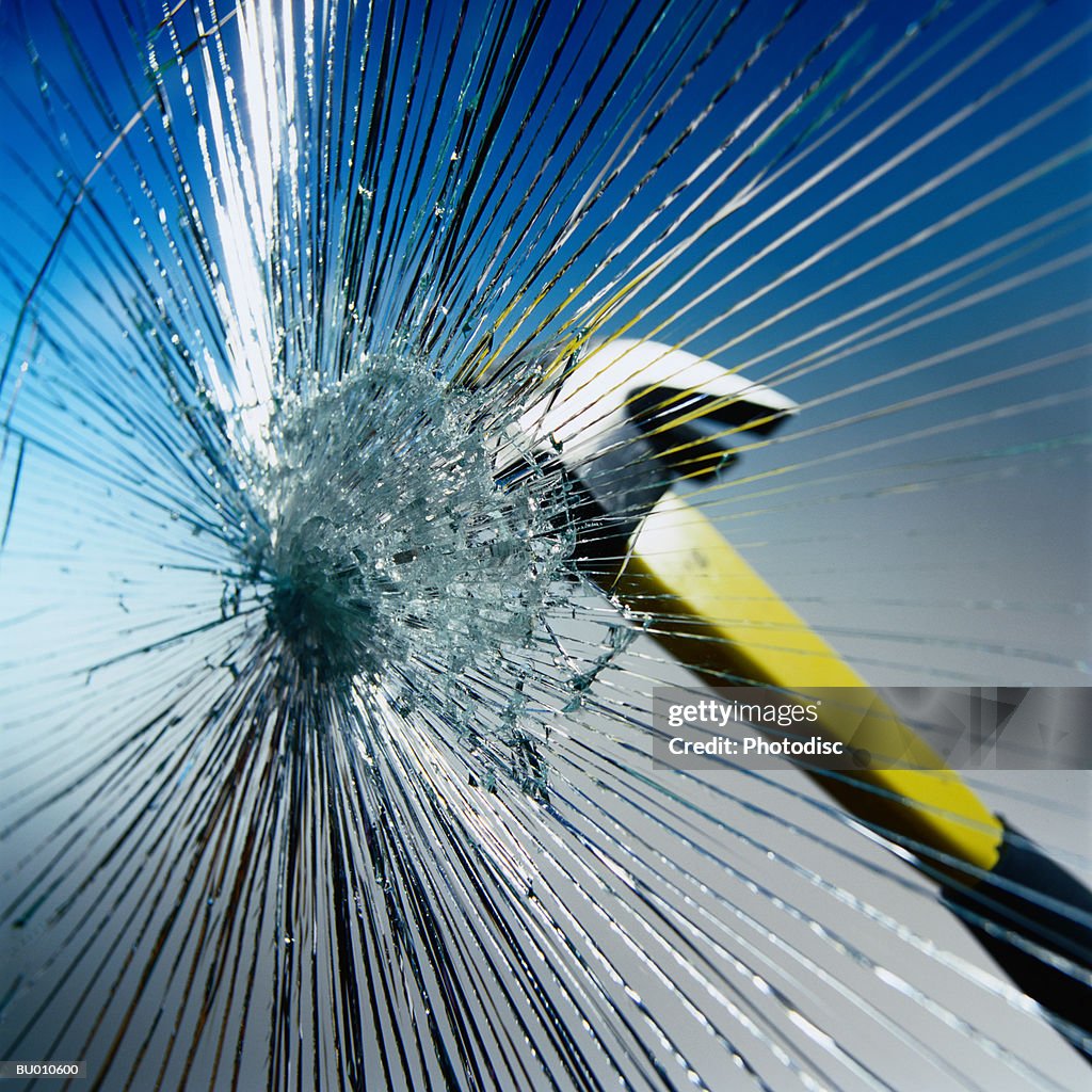 Hammer Hitting Glass
