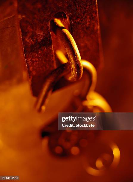 open padlock hanging from a latch - latch stock-fotos und bilder