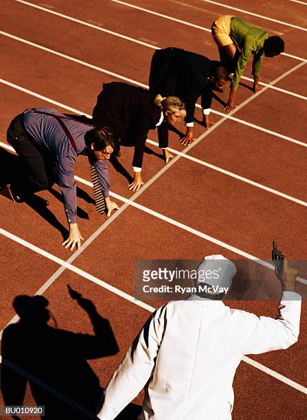 businesspeople at a starting line - race official stock pictures, royalty-free photos & images