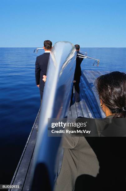 business person carrying a racing shell - 65137 stock pictures, royalty-free photos & images