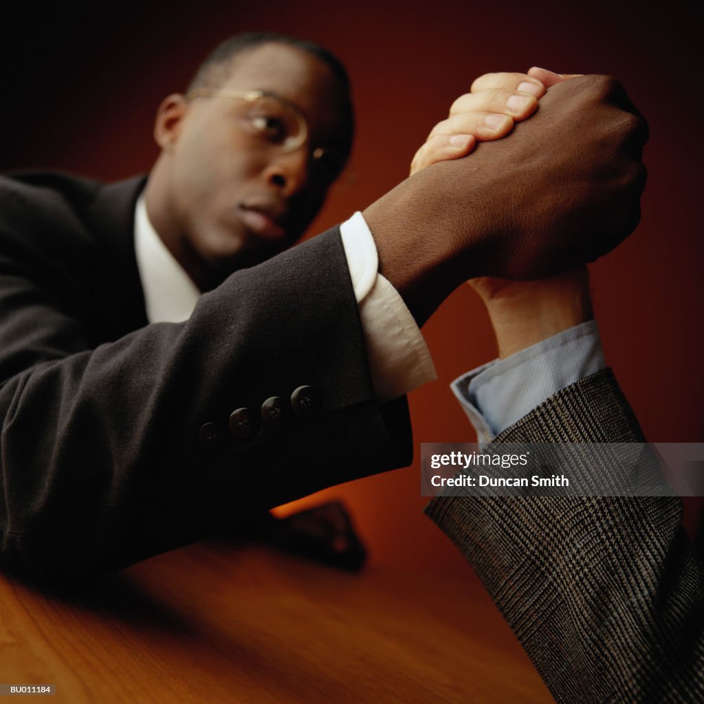 Businessmen Arm Wrestling