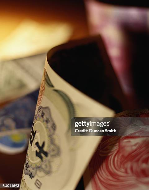 detail of japanese yen and hong kong dollars - hong kong currency bildbanksfoton och bilder