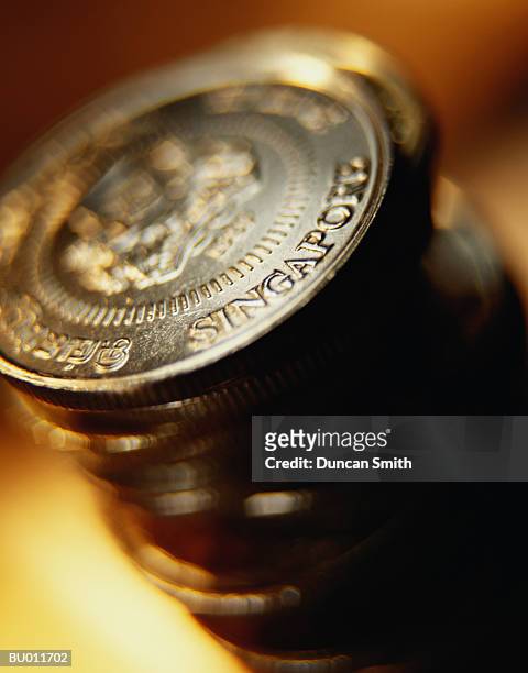 close-up of singaporean coins - singapore cents stock pictures, royalty-free photos & images