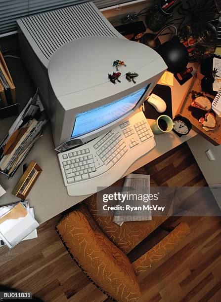 above view of computer on an office desk - ergonomic keyboard stock pictures, royalty-free photos & images