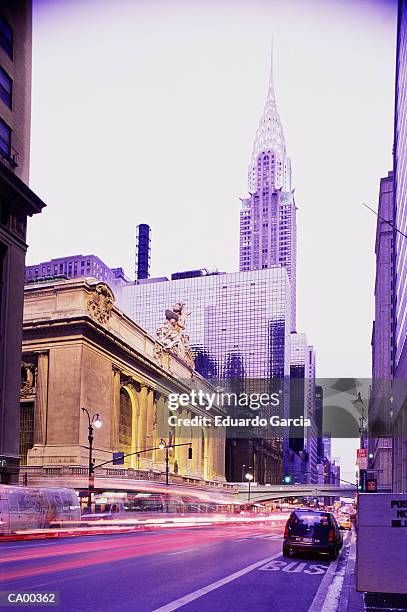 usa, new york, new york city, 42nd street (long exposure) - the chrysler building and grand central station stock pictures, royalty-free photos & images