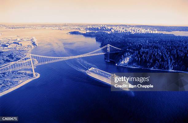 canada, vancouver, cruise ship at lion's gate bridge (blue toned) - vancouver lions gate stock-fotos und bilder