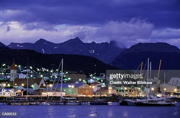 argentina, tierra del fuego, ushuaia, waterfront and skyline, night - tierra imagens e fotografias de stock