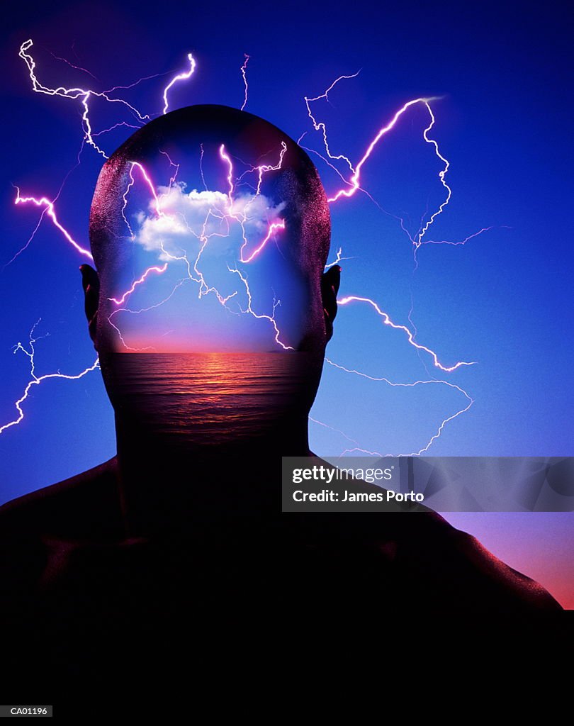 Man with bolts of lightning projected on head