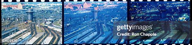 train yard at day, dusk, and night (triptych) - train yard at night stock pictures, royalty-free photos & images