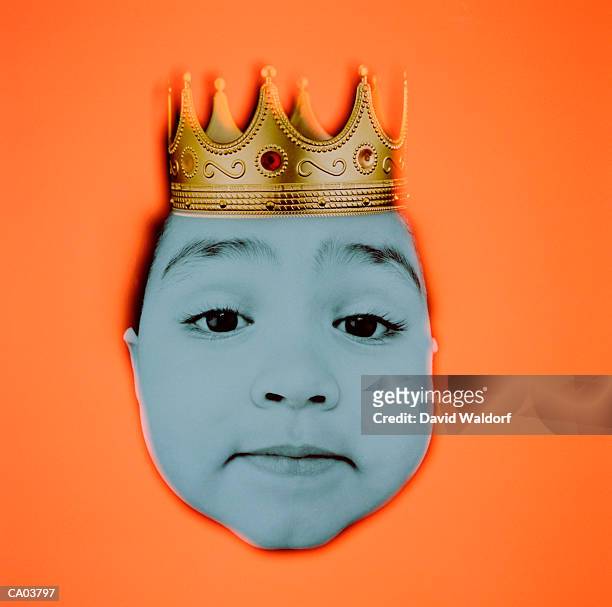boy (2-4) wearing crown (composite) - street party held marking one year since death of prince stockfoto's en -beelden
