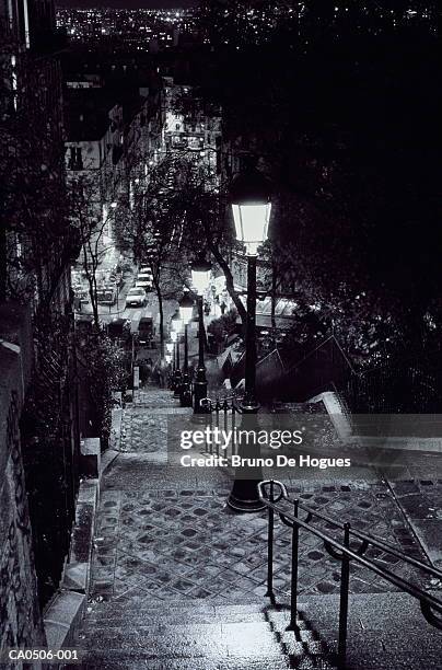 steps leading down to cafe area, monmartre, paris, france (b&w) - over de 90 stock pictures, royalty-free photos & images