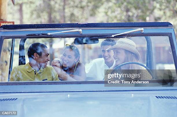 teenage couples (15-18) sitting in sport utility vehicle - four people in car stock pictures, royalty-free photos & images