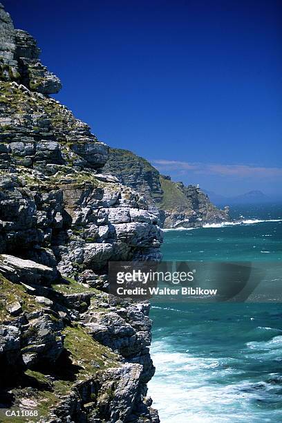 south africa, cape peninsula, cliffs andcape point lighthouse - cape point stock pictures, royalty-free photos & images