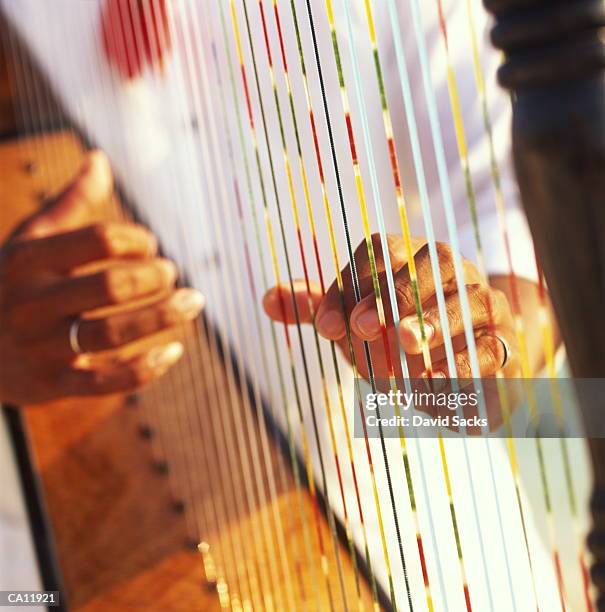 person playing harp, close-up - harp stock pictures, royalty-free photos & images