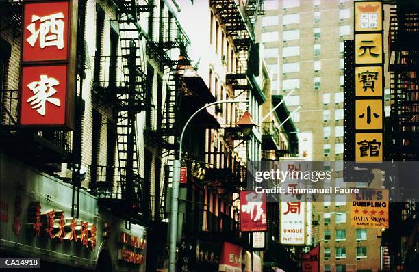 usa, new york, new york city, chinatown, street scene, low angle - usa city stock pictures, royalty-free photos & images