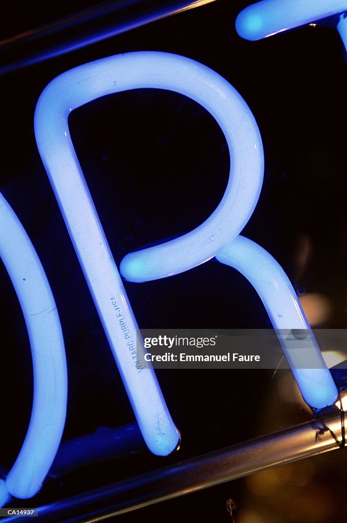 Letter 'R' on neon sign, close-up