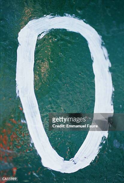 number '0' painted on green wall, close-up - noughts stock pictures, royalty-free photos & images