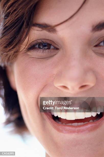 young woman smiling, portrait, close-up - smiling eyes stock pictures, royalty-free photos & images