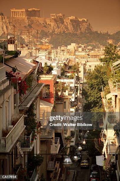 greece, athens, kolonaki area, acropolis in background - athens2004travel fotografías e imágenes de stock