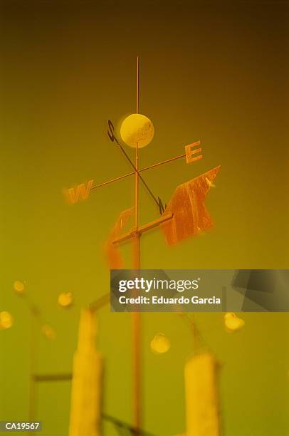 weather vane, low angle view (green tone) - garcia stock-fotos und bilder