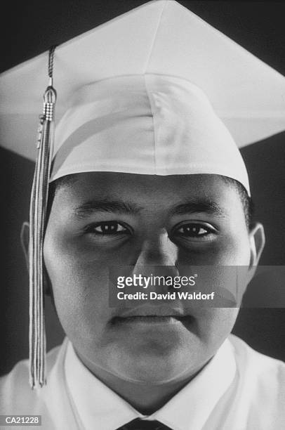 teenage boy (12-14) in cap and gown, portrait, close-up (b&w) - waldorf fotografías e imágenes de stock