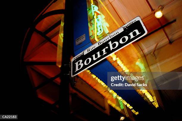 usa, louisiana, new orleans, 'bourbon' street sign at night - new orleans fotografías e imágenes de stock