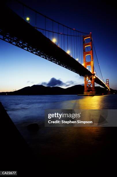 golden gate bridge at night san francisco, ca - ca stock-fotos und bilder