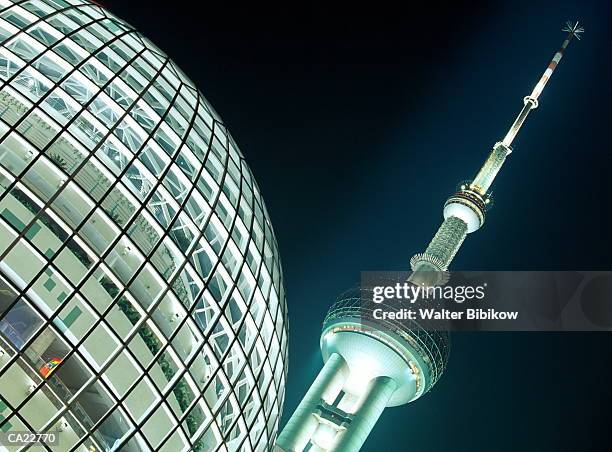 china, shanghai, pudong, oriental pearl tower, night, low angle view - oriental stockfoto's en -beelden