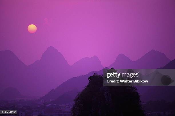 china, guangxi province, guilin, mountains at sunset, silhouette - province stock pictures, royalty-free photos & images