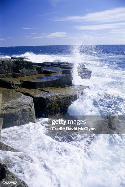 wave crashing against rock - wave rock stock pictures, royalty-free photos & images