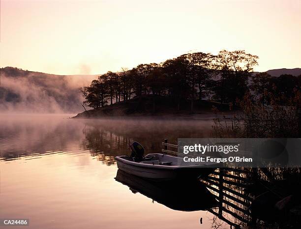 mist over derwent water lake - breien stock pictures, royalty-free photos & images