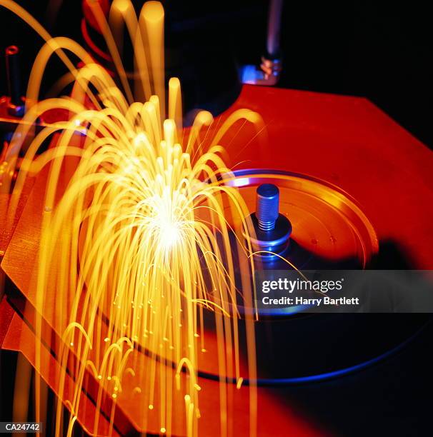 welding emitting sparks, close-up - sparks bildbanksfoton och bilder